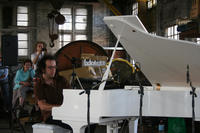 Anthony Pateras performing on a prepared piano in the Junee Railway Roundhouse workshop  &copy; Bestimmte Rechte vorbehalten von <a href="http://www.flickr.com/photos/infetel/">bureau.infetel </a>